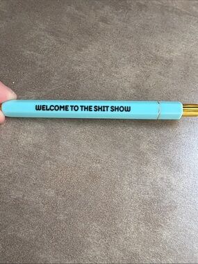 Blue pen  'Welcome to the Shit Show'